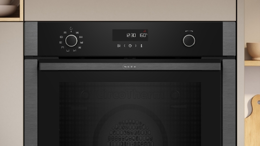 Neff B6ACH7AG3 N 50, Backofen, 60 x 60 cm, Graphite-Grey Pyrolyse und EasyClean,Hide® : die voll versenkbare Tür